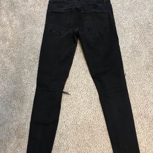 Distressed black skinny